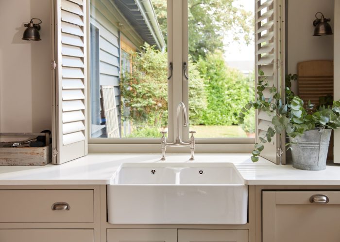 Domestic kitchen with clean sink and countertop